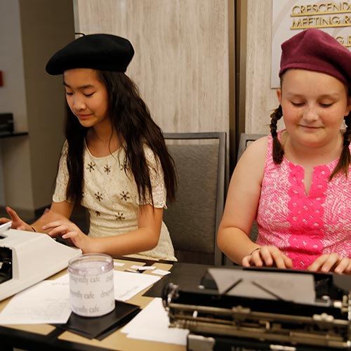 young-girls-using-a-typewriter